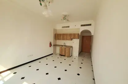 Apartment - Studio - 1 Bathroom for rent in Al Jawhara Building - Al Rawda 3 - Al Rawda - Ajman