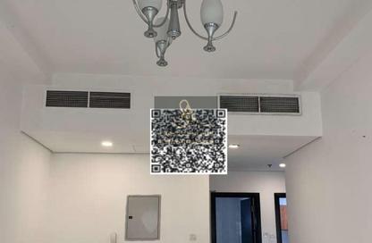 Apartment - 1 - 2 for sale in Lilies Tower - Emirates City - Ajman