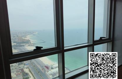 Apartment - 2 Bedrooms - 2 Bathrooms for sale in Corniche Tower - Ajman Corniche Road - Ajman