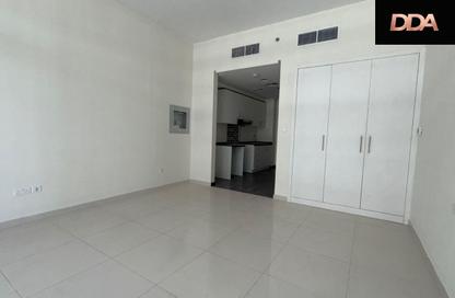 Apartment - Studio - 1 for rent in Golf Promenade 4A - Golf Promenade 4 - Golf Town - Damac Hills - Dubai