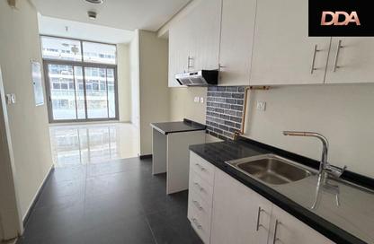 Apartment - Studio - 1 for rent in Golf Promenade 4A - Golf Promenade 4 - Golf Town - Damac Hills - Dubai