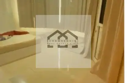 شقة - غرفة نوم - 2 حمامات للبيع في أورينت تاور 1 - أورينت تاور - البستان - عجمان