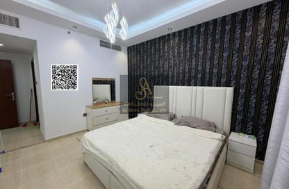 Apartment - 1 Bedroom - 2 Bathrooms for sale in Orient Tower 1 - Orient Towers - Al Bustan - Ajman
