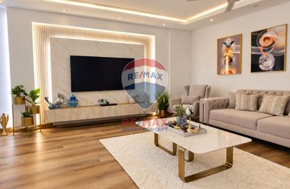 Apartment - 3 - 4 for sale in Tower 5 - Al Reef Downtown - Al Reef - Abu Dhabi