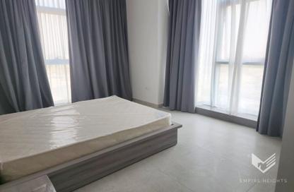 Apartment - 2 - 2 for sale in The V Tower - Dubai Land Residence Complex - Dubai