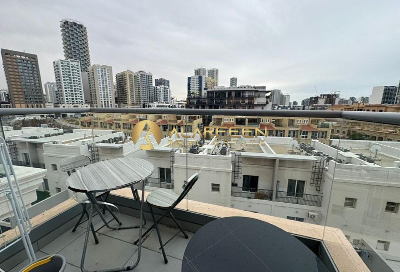 Furnished Studio | Balcony & City View photo 7