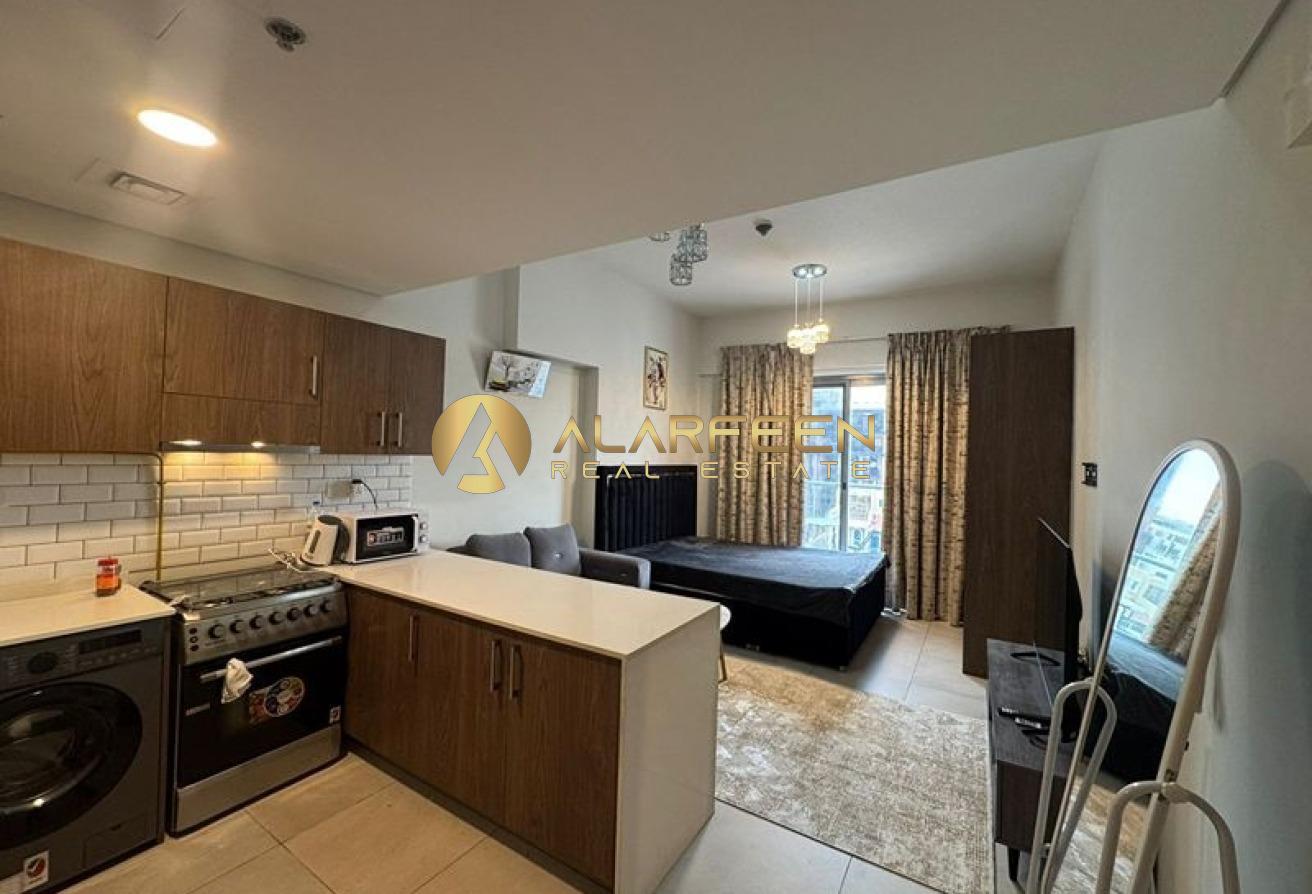 Furnished Studio | Balcony & City View photo 2