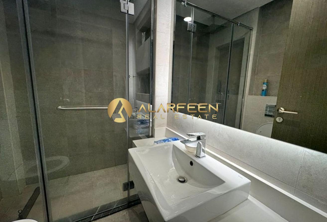 Furnished Studio | Balcony & City View photo 8