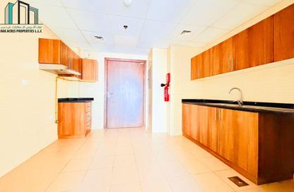 Apartment - Studio - 1 for rent in Remal Tower - District 13 - Jumeirah Village Circle - Dubai