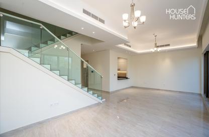 Villa - 4 - 4 for rent in Sevilla Village - Victory Heights - Dubai Sports City - Dubai
