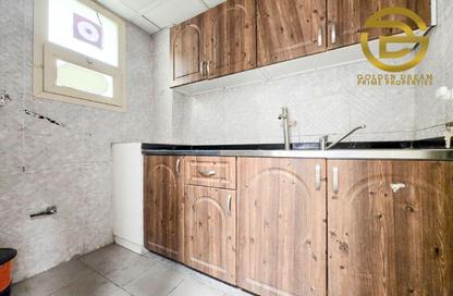 Warehouse - Studio - 2 Bathrooms for rent in Al Qusais - Dubai