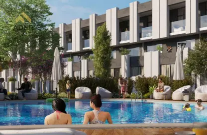 Townhouse - 4 Bedrooms - 5 Bathrooms for sale in Reportage Village - Dubai Land - Dubai