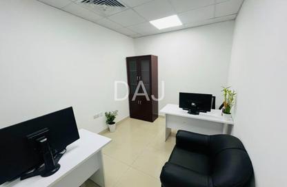 Office Space - Studio - 1 Bathroom for rent in Al Rostamani Building - Port Saeed - Deira - Dubai