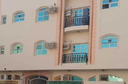 عمارة بالكامل للبيع في مجمع مويلح - تجارية مويلح - الشارقة