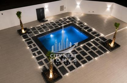 Villa - 5 Bedrooms - 7 Bathrooms for rent in Madinat Hind 3 - Dubai Land - Dubai
