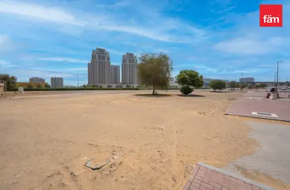 Land - Studio for sale in Queue Point - Liwan - Dubai