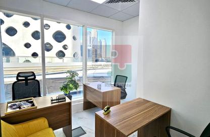 Business Centre - Studio - 2 Bathrooms for rent in The Bay View - Business Bay - Dubai