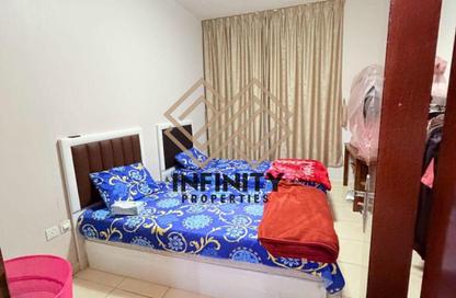 Apartment - 2 Bedrooms - 2 Bathrooms for sale in Orient Tower 1 - Orient Towers - Al Bustan - Ajman