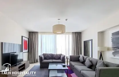 النزل و الشقق الفندقية - غرفة نوم - 2 حمامات للايجار في برج نسيمه - شارع الشيخ زايد - دبي