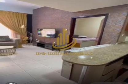 Apartment - 1 Bedroom - 2 Bathrooms for sale in Almond Tower - Garden City - Ajman