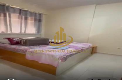 Apartment - 1 Bedroom - 2 Bathrooms for sale in Almond Tower - Garden City - Ajman