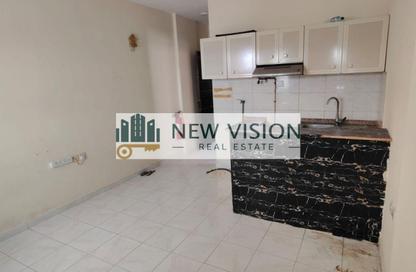 Apartment - Studio - 1 Bathroom for rent in Al Butina 9 Building - Al Butina - Sharjah