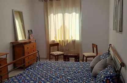 شقة - غرفة نوم - 2 حمامات للايجار في K10 - طراز يوناني - المدينة العالمية - دبي