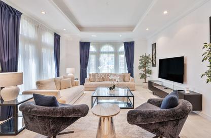 Villa - 4 Bedrooms - 5 Bathrooms for rent in Canal Cove Frond A - Canal Cove Villas - Palm Jumeirah - Dubai