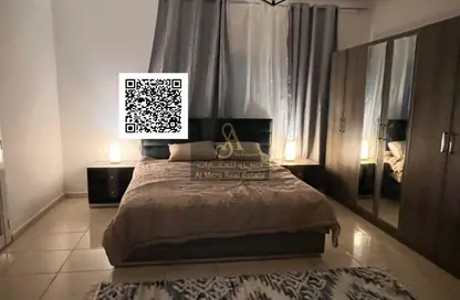 شقة - غرفة نوم - 2 حمامات للبيع في أورينت تاور 1 - أورينت تاور - البستان - عجمان