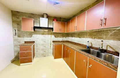 Apartment - 1 - 2 for rent in Al Jawaher Building - International City Phase 2 - Al Warsan 4 - Al Warsan - Dubai