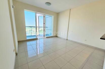 Apartment - 1 Bedroom - 2 Bathrooms for rent in Cricket Tower - Dubai Sports City - Dubai