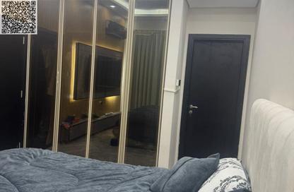 Apartment - 1 - 2 for sale in Lilies Tower - Emirates City - Ajman