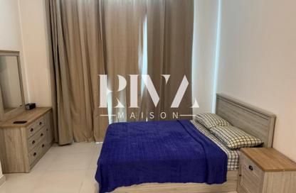Apartment - 1 Bedroom - 2 Bathrooms for rent in Rabdan Building - Motor City - Dubai