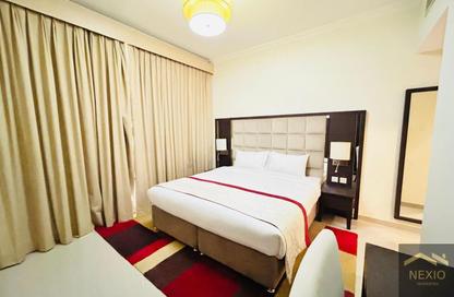 Apartment - 1 - 2 for rent in Siraj Tower - Arjan - Dubai