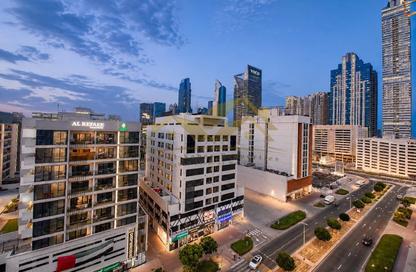 Apartment - 1 Bedroom - 2 Bathrooms for rent in Jumeirah Garden City - Al Satwa - Dubai