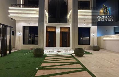 Villa - 5 Bedrooms - 7 Bathrooms for sale in Ajman Hills - Al Alia - Ajman