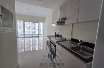 Apartment - Studio - 1 for rent in Viridis Residences C - Viridis Residences - Damac Hills 2 - Dubai