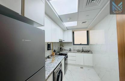 Apartment - 2 Bedrooms - 2 Bathrooms for sale in Waha Living - Jumeirah Garden City - Al Satwa - Dubai