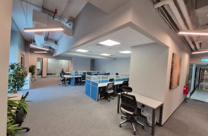 Half Floor - Studio - 4 Bathrooms for rent in Iris Bay - Business Bay - Dubai