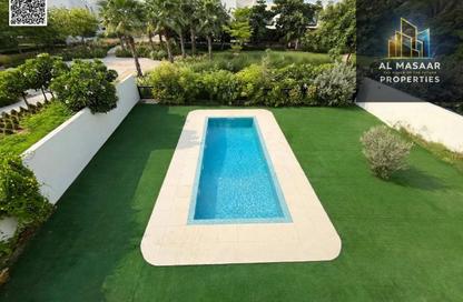 Villa - 5 - 7 for sale in Golf Community - Al Zorah - Ajman Villa - 5 - 7 for sale in Golf Community - Al Zorah - Ajman