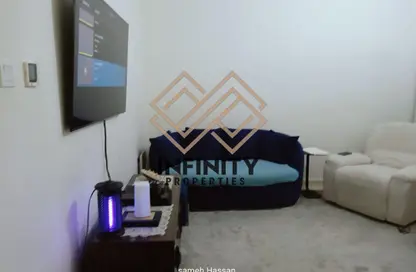 شقة - غرفة نوم - 2 حمامات للبيع في أورينت تاور 1 - أورينت تاور - البستان - عجمان