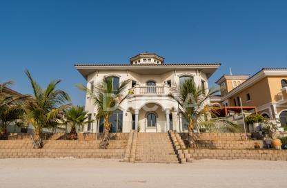 Villa - 5 Bedrooms - 6 Bathrooms for rent in Garden Homes Frond E - Garden Homes - Palm Jumeirah - Dubai