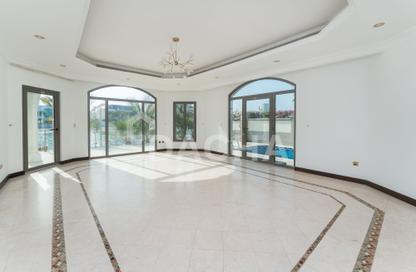 Villa - 5 Bedrooms - 6 Bathrooms for rent in Garden Homes Frond E - Garden Homes - Palm Jumeirah - Dubai