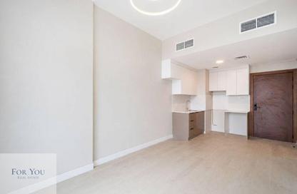 Apartment - 1 - 2 for sale in Rukan Residence - Rukan - Dubai