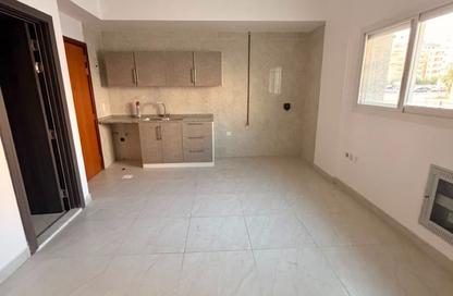 Apartment - Studio - 1 Bathroom for rent in Al Butina 9 Building - Al Butina - Sharjah