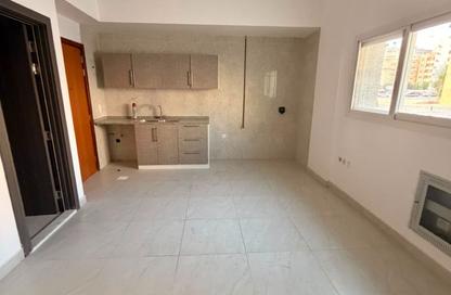 Apartment - Studio - 1 Bathroom for rent in Al Butina 9 Building - Al Butina - Sharjah