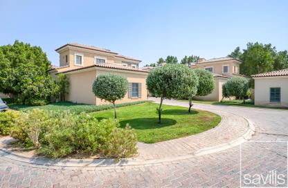 Villa - 4 - 4 for sale in Whispering Pines - Jumeirah Golf Estates - Dubai