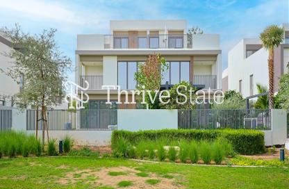 Villa - 4 - 5 for sale in Aura Gardens - Tilal Al Ghaf - Dubai
