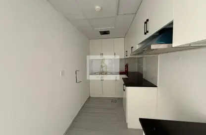 Apartment - 1 Bedroom - 2 Bathrooms for rent in Al Amir Abdullah Building - International City Phase 2 - Al Warsan 4 - Al Warsan - Dubai