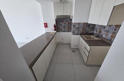Apartment - 1 Bedroom - 2 Bathrooms for rent in Rabdan Building - Motor City - Dubai